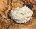 Oyster necklace with inlaid stone