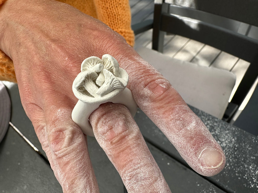 Porcelain ring with mushroom cluster