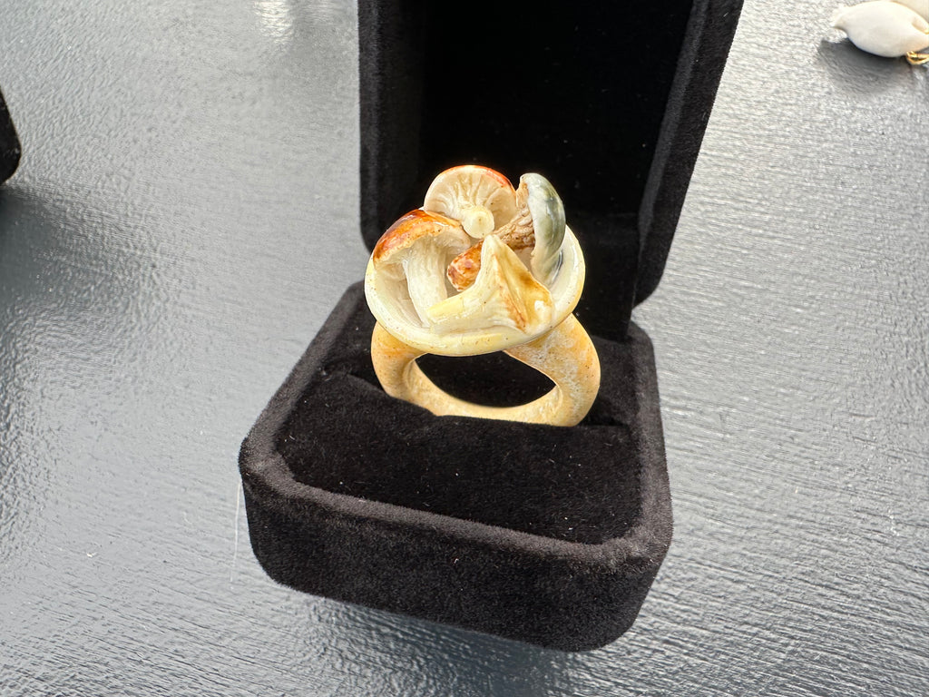 Porcelain ring with mushroom cluster